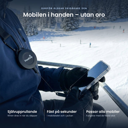 Mobilen i handen i liften – utan oro